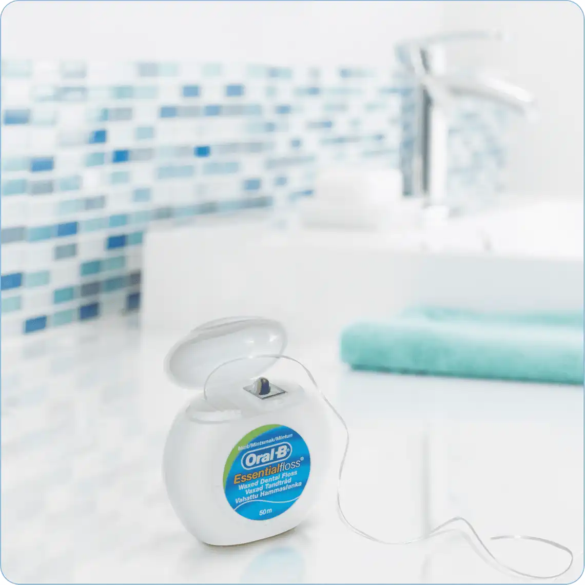 Фото 5 - Нитка зубна Oral-B Essential М'ятна 50 м
