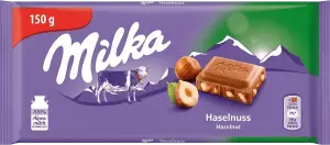 Фото 1 - Шоколад Milka Huzelnuts молочний з подрібненим лісовим горіхом 150 г