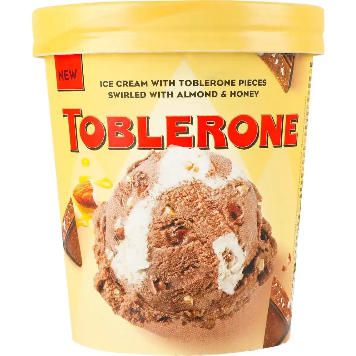 Фото 1 - Морозиво Toblerone какао-медове з медом, мигдальним соусом та шматочками шоколаду 300г