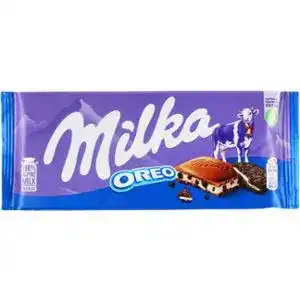 Шоколад Milka молочний зі смаком ванілі та шматочками печива Oreo 100 г